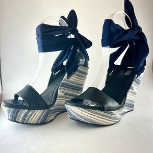 Stunning UGG high platform wedge sandals.